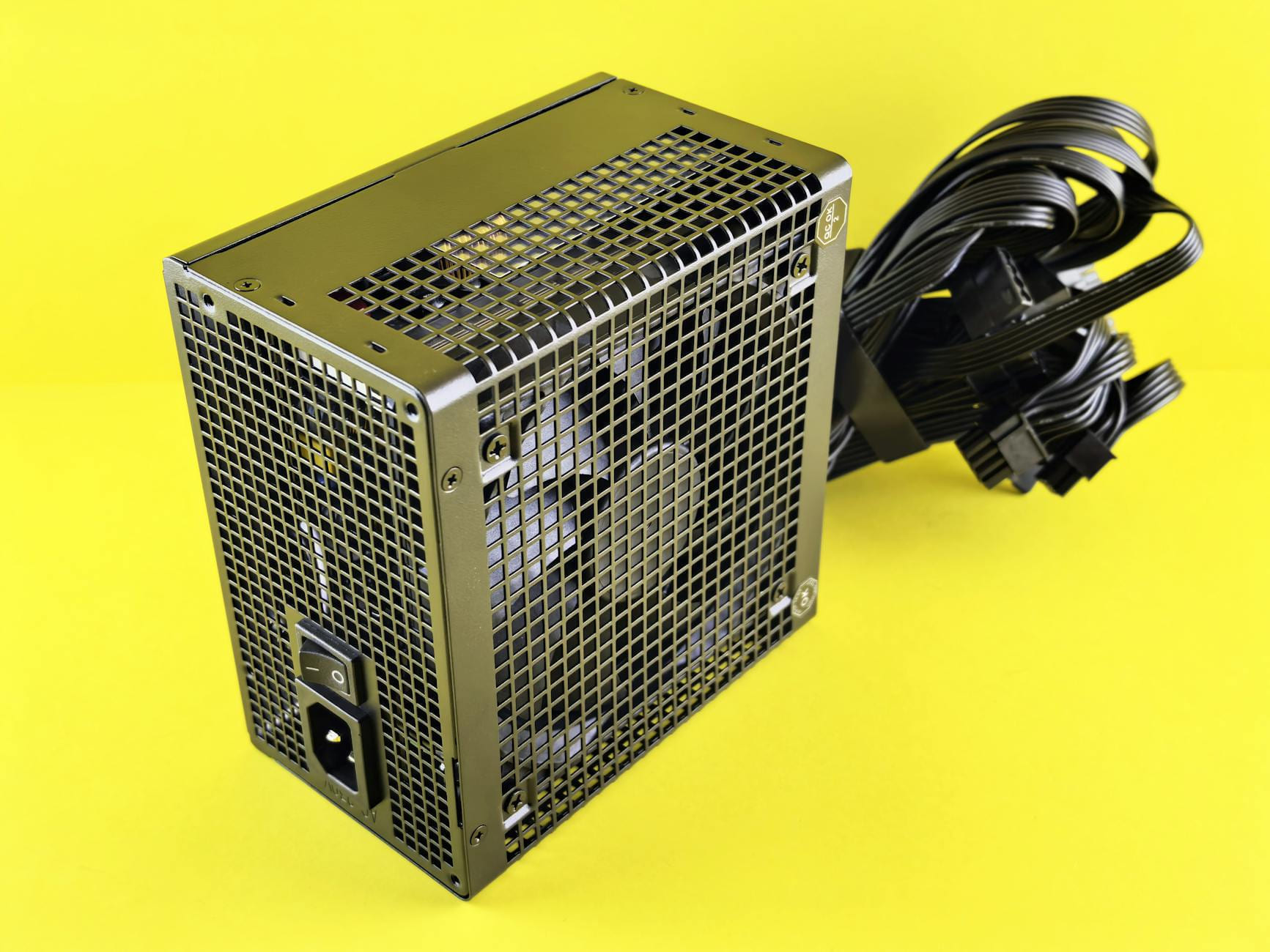 A powerful gaming PSU on yellow background, ideal for desktop setups. on Frame Rate Vault
