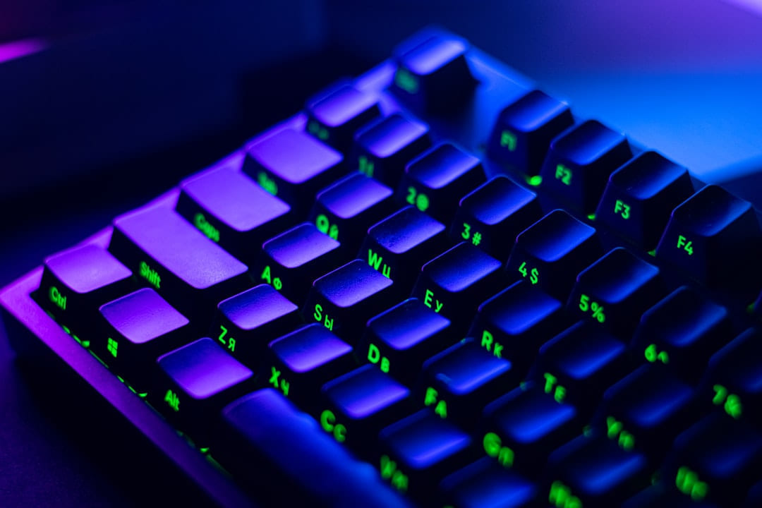 a close up of a keyboard with green keys on Frame Rate Vault