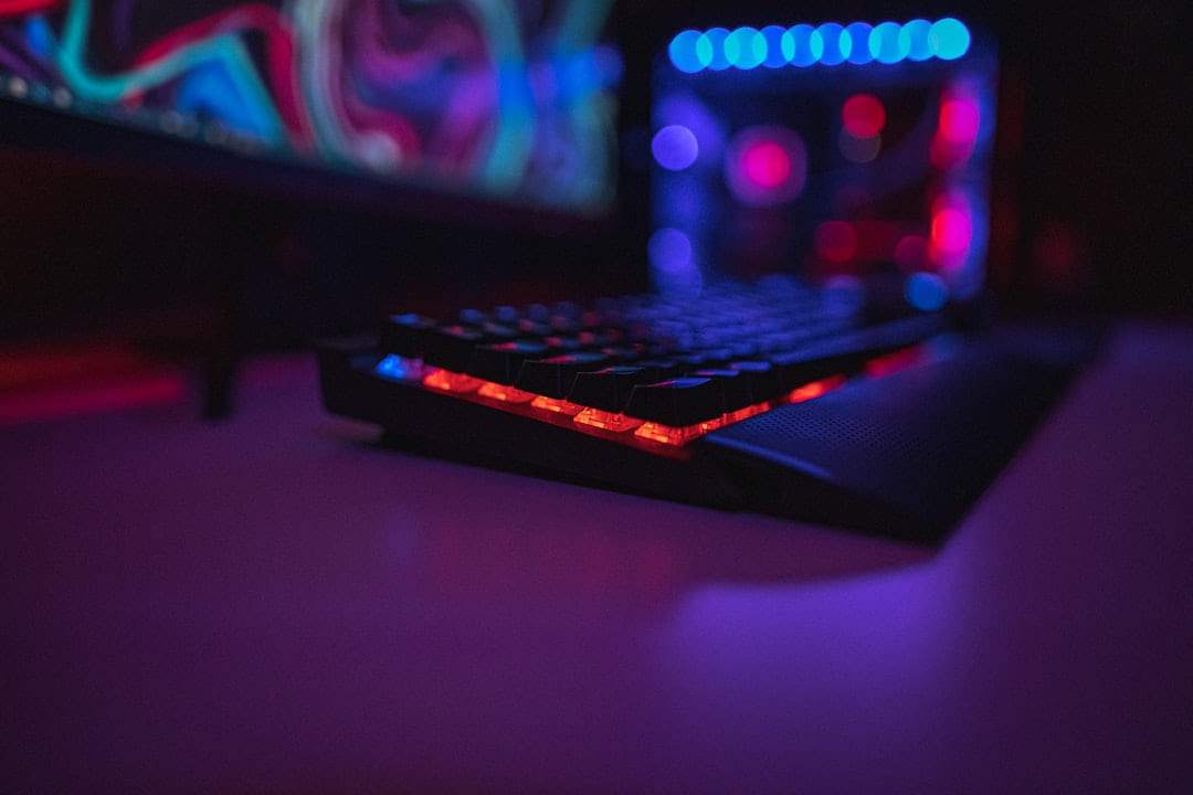 black computer keyboard on brown wooden table on Frame Rate Vault
