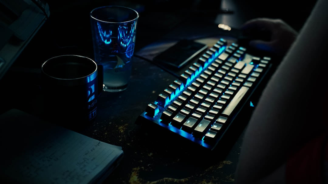 a keyboard and a glass of water on Frame Rate Vault