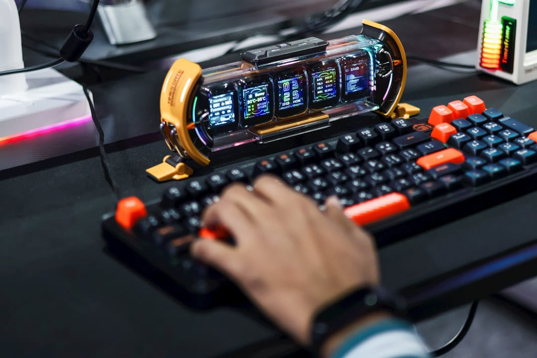 Gamer typing on a futuristic keyboard with multiple screens. on Frame Rate Vault