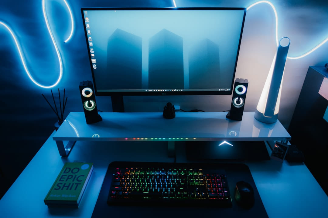 a computer desk with a keyboard and speakers on Frame Rate Vault