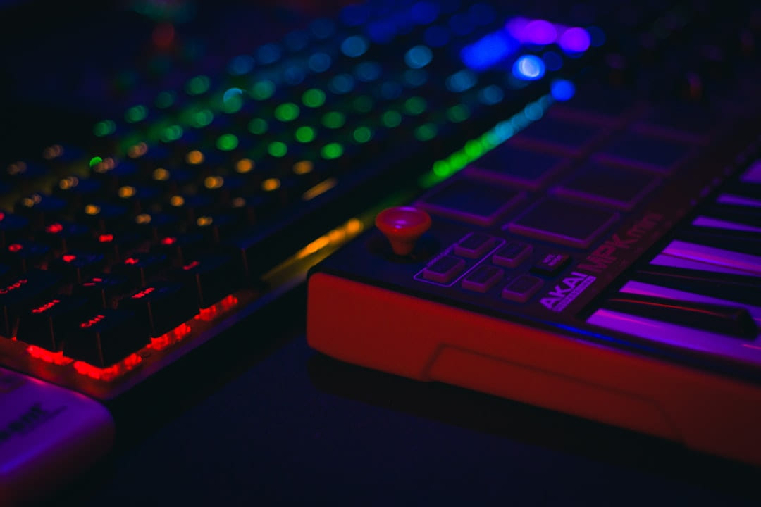 Close-up of a colorful illuminated keyboard and music controller. on Frame Rate Vault
